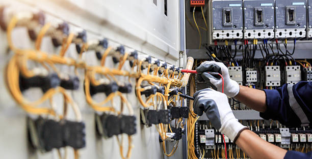 Professional Electrician technician working in Cypress Quarters, FL
